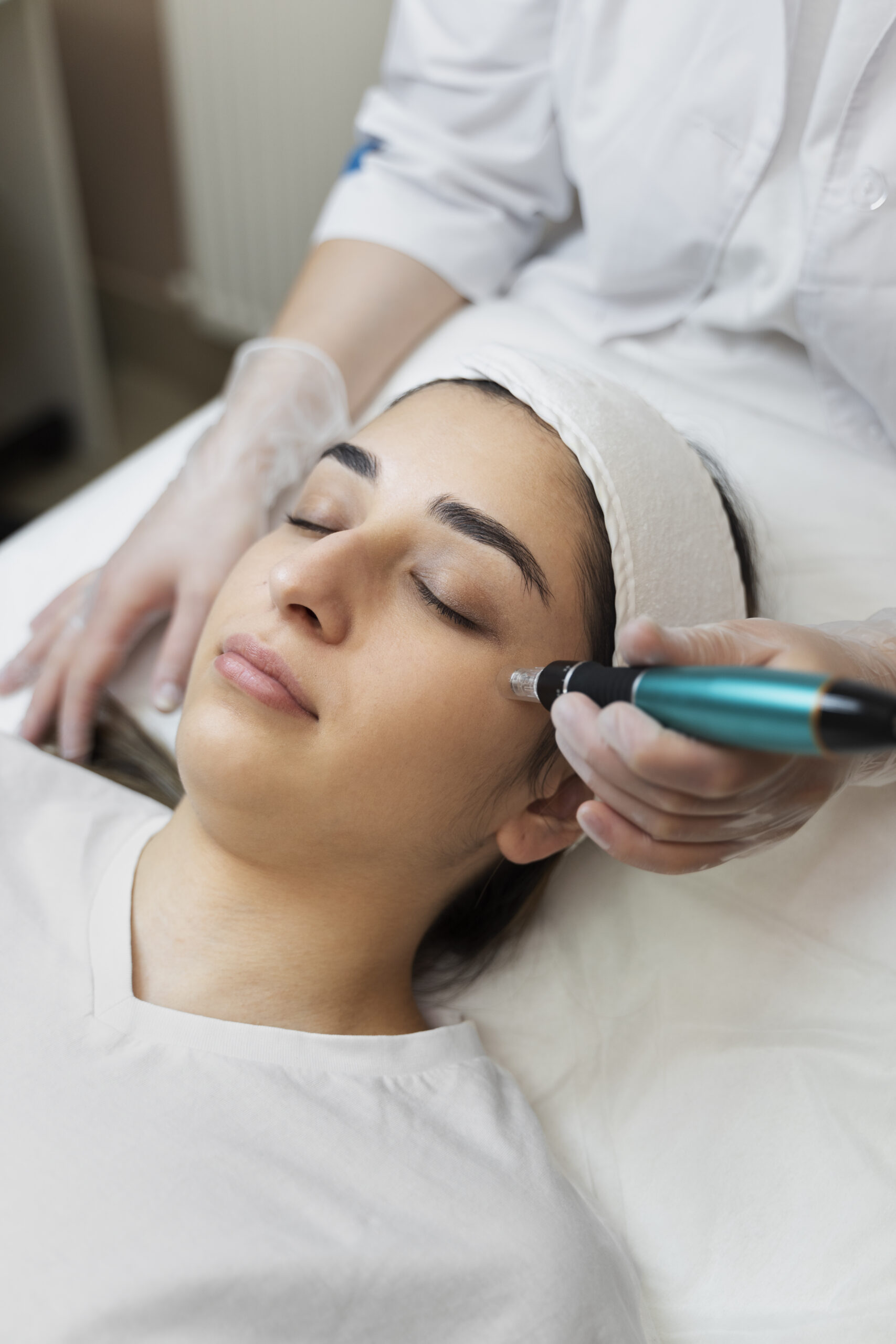 person-getting-micro-needling-beauty-treatment (1)